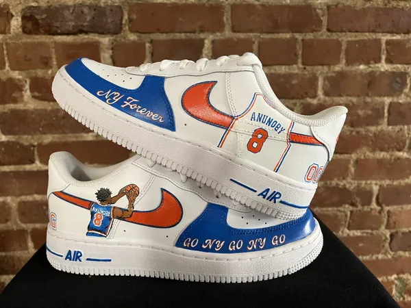 Custom painted sneakers showcasing intricate hand-done artwork